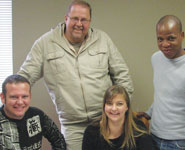 Iritron project team Etienne van Dyk (seated), Gideon Roux, Judy Flynn and Edgar Chauke going over the specifications